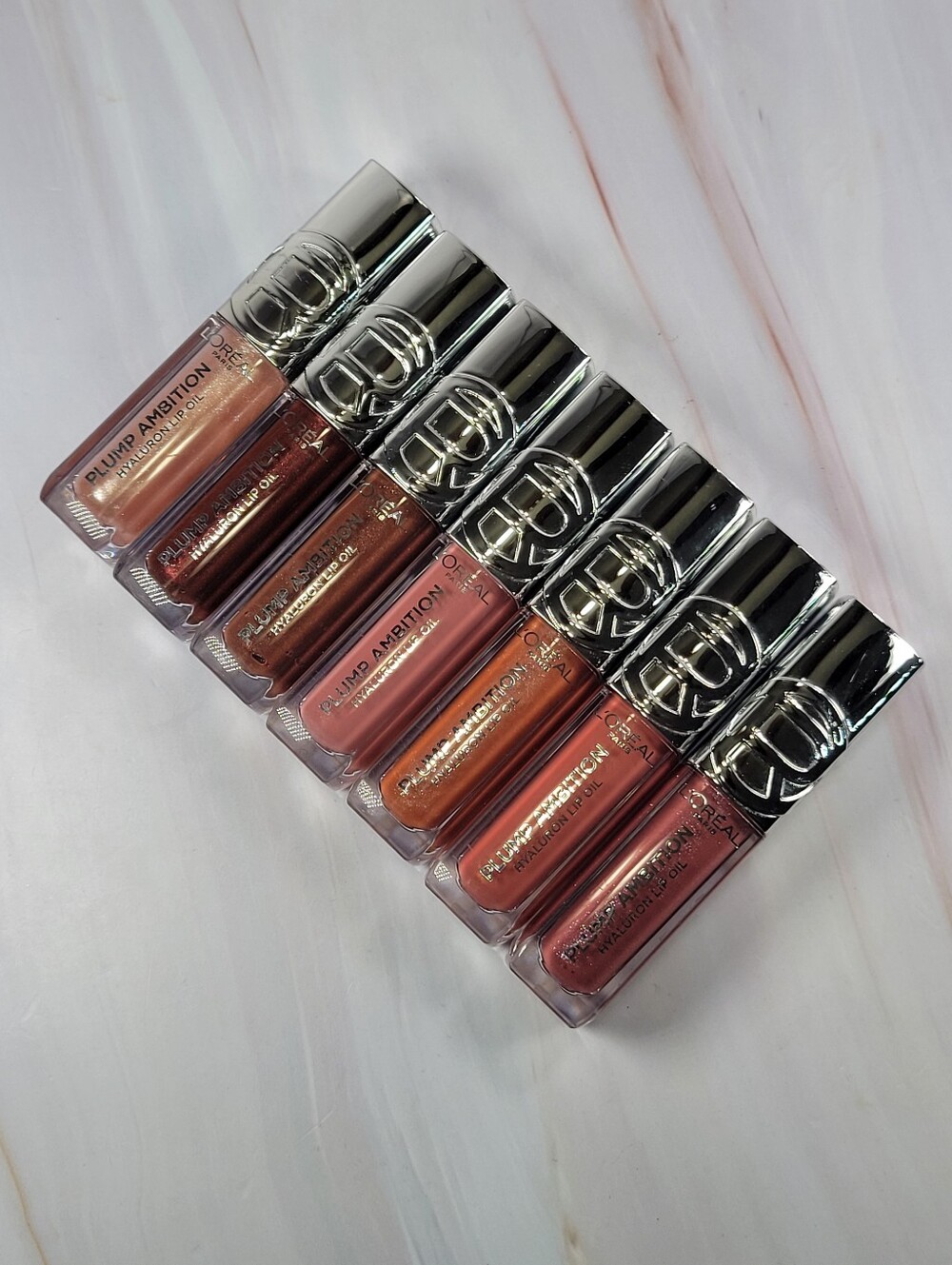 7 Piece L'Oréal Plump Ambition Hyaluron Lip Oil Bundle NEW!
